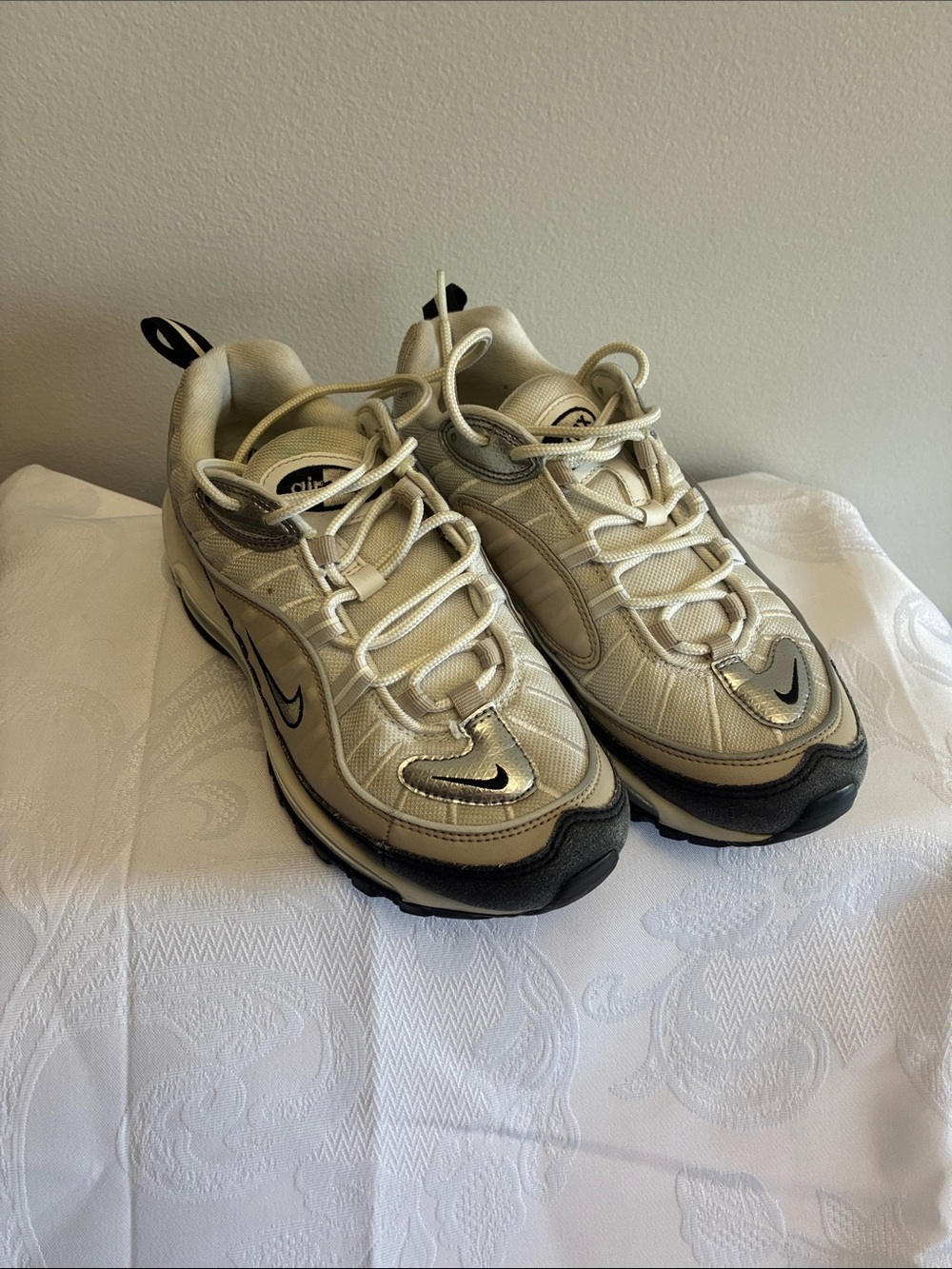Nike women’s Beige and Black Lace-Up Sneakers
